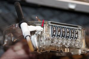 Bild 4 Rückstelltaster ausklipsen